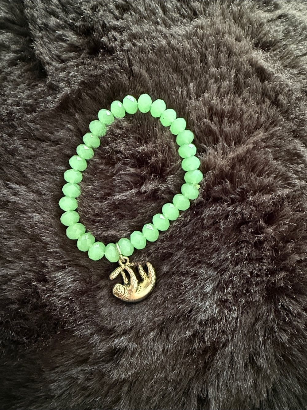 Green Beaded Bracelet with Gold Sloth Charm